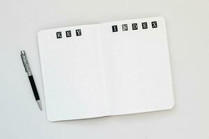 Filling in the diary, the inscription Key, Index in a dot notebook photo