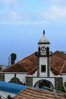 a church with a clock tower photo