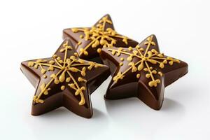 chocolate Belén estrella con dorado comestible decoraciones para Navidad aislado en un blanco antecedentes foto