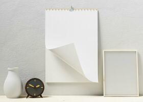 potrait desk calendar with blank of paper suitable for calendar design presentation photo