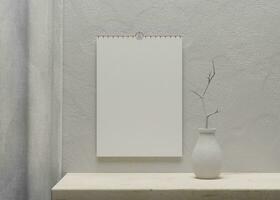 potrait desk calendar with blank of paper suitable for calendar design presentation photo