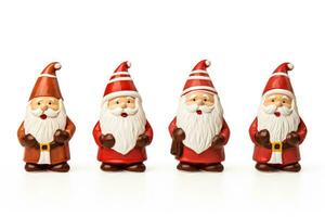 Hand painted details on gourmet chocolate Santas isolated on a white background photo
