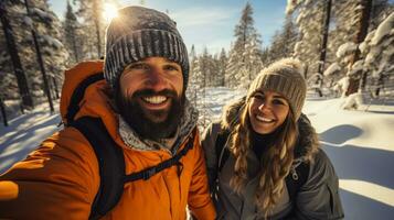 Joyful couple traverses snowy pine forest on a snowshoeing expedition photo