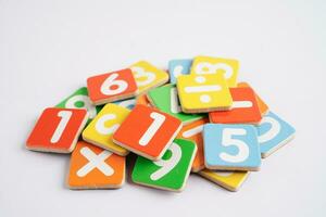 Number wood block cubes for learning Mathematic, education math concept. photo