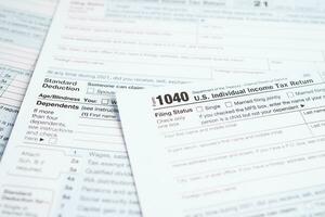 Tax form 1040 U.S. Individual Income Tax Return, business finance concept. photo