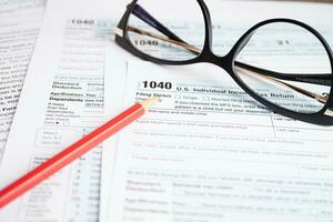 Tax form 1040 U.S. Individual Income Tax Return, business finance concept. photo