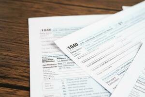 Tax form 1040 U.S. Individual Income Tax Return, business finance concept. photo