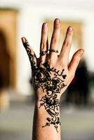 A hand painted with henna paint photo