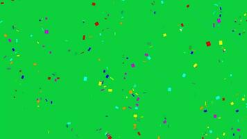 festa celebração colorida confete partícula queda animação em verde tela fundo, multicolorido confete papel partículas animação efeito fundo video