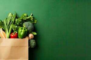 Shopping bag full of fresh organic vegetables on green background. Healthy food concept.  Generative AI photo