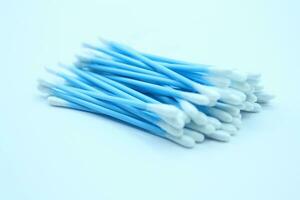 Cotton swabs isolated on white background. Close-up. cotton bud photo