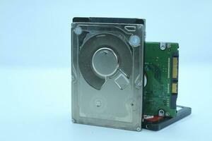 Hard disk drive isolated on a white background. Computer hardware technology. photo