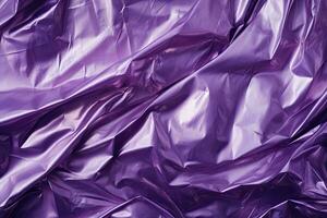 purple violet plastic wrap overlay backdrop. crumpled and draped textured cellophane material photo
