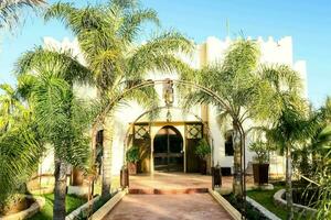 Villa surrounded by palm trees - Morocco 2022 photo