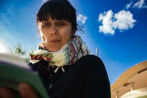 Woman reading book photo