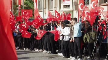 Turkey istanbul 29 th October 2023. hand holding turkish flag celebrates 100year anniversary as a republic. video
