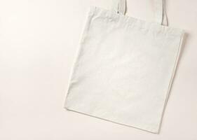 Mockup empty template White cream shopping bag for your design, eco friendly, zero waste photo