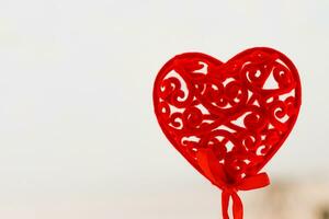 Decorative red heart for valentine's day on a white background. photo