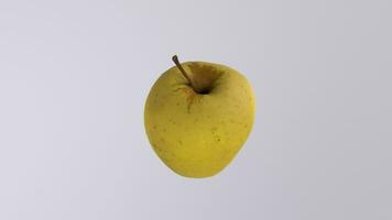 a yellow apple is shown in a 3d model video