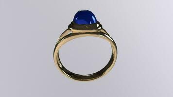 uma anel com uma azul pedra dentro ouro video