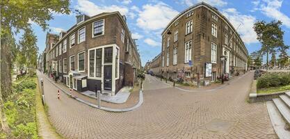 Typical residential street in the Dutch metropolis of Amsterdam in summer 2023 photo