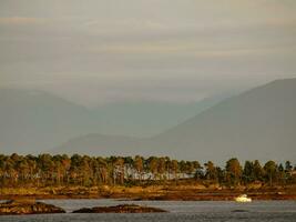 ship cruise in the norwegian fjords photo