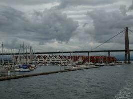 ship cruise in the norwegian fjords photo