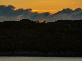 ship cruise in the norwegian fjords photo