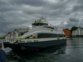 ship cruise in the norwegian fjords photo