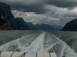 ship cruise in the norwegian fjords photo