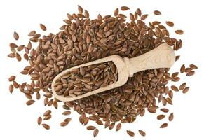 Flax seeds in wooden scoop isolated on white background photo