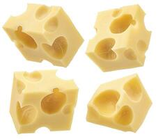 Swiss cheese cubes isolated on white background photo