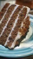 chocolate and cream cake on a plate on table video