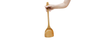 wooden spatula in hand PNG transparent