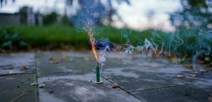 Little green fountain fireworks. Firecrackers shooting. photo