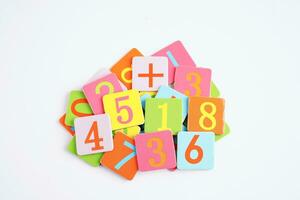 Number wood block cubes for learning Mathematic, education math concept. photo