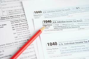 Tax form 1040 U.S. Individual Income Tax Return, business finance concept. photo