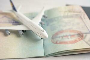 Approved Stamp visa and passport document to immigration at airport in country. photo