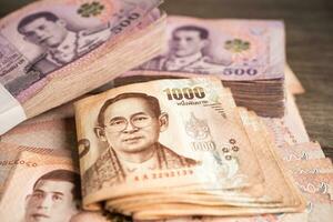 Thai baht banknotes, business saving finance investment concept. photo