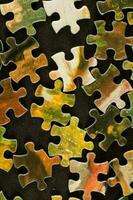 a puzzle piece is shown with a black background photo