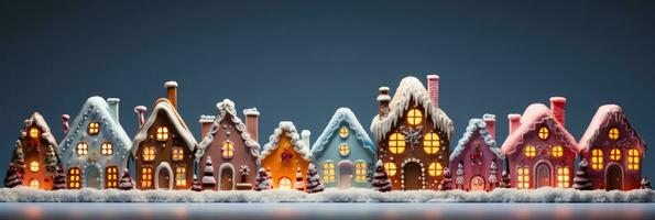 encantador Navidad pan de jengibre chalets adornado con dulces aislado en un degradado antecedentes foto