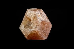 macro mineral garnet stone on a black background photo