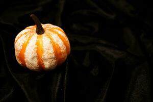 Halloween decorations background. Halloween Scary pumpkin head on wooden table Halloween holiday concept photo