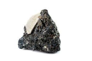 Macro mineral stone Schorl, Black Tourmaline on a white background photo