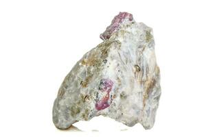 Macro mineral stone Ruby in rock on white background photo