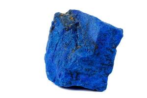 Macro Azurite mineral stone with Pyrite inserts on a white background photo