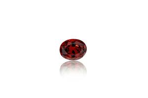 macro mineral faceted stone Garnet on a white background photo
