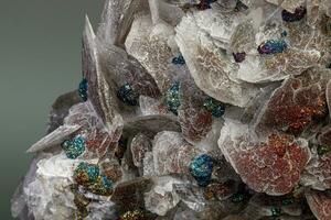 Macro Calcite Stone Minerals with Chalcopyrite on a Gray Background photo