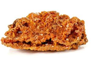 Macro stone mineral Wulfenite on a white background photo