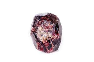 Macro of a mineral garnet stone on a white background photo